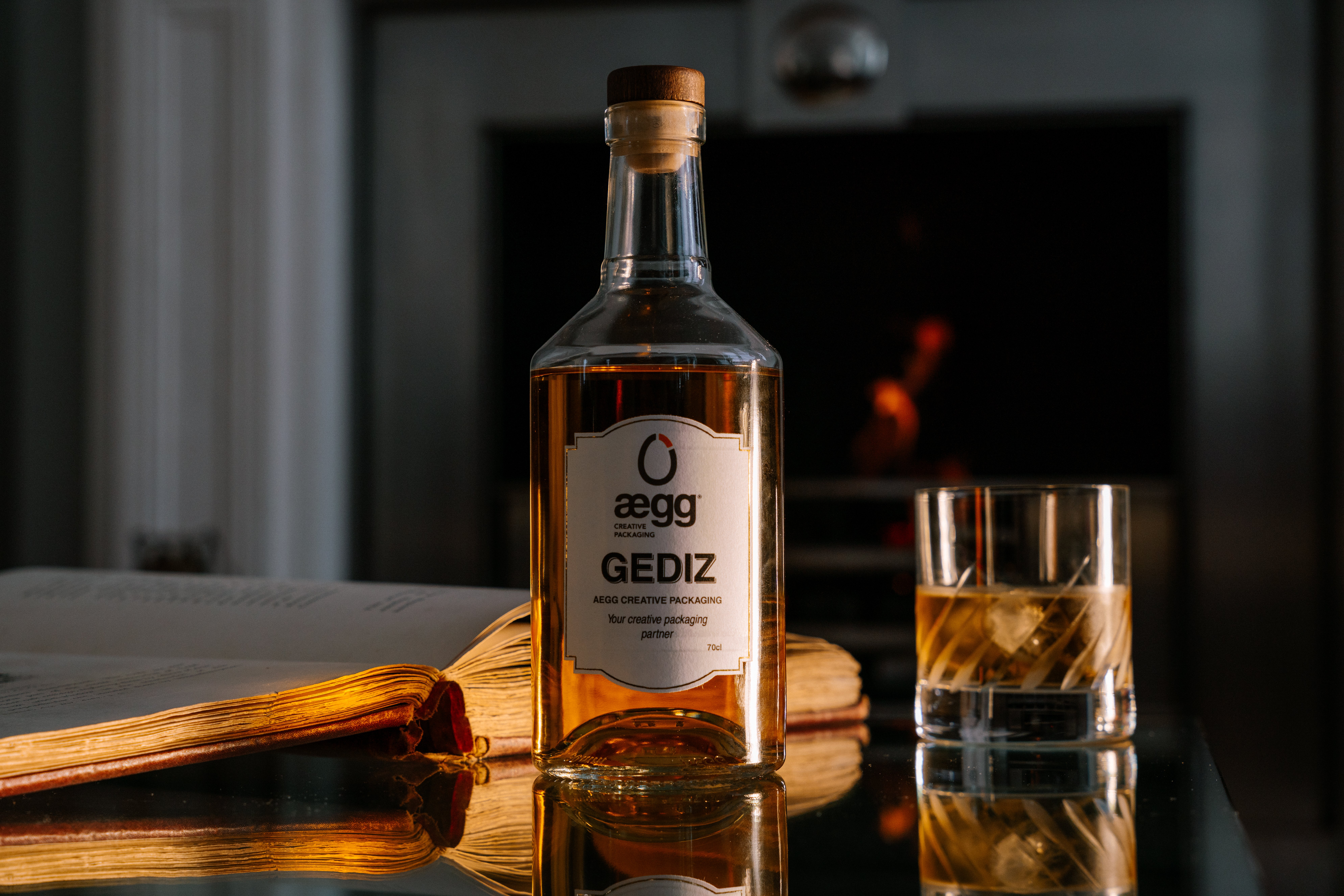 Aegg's Gediz spirit bottle, seen here by a warming fire 